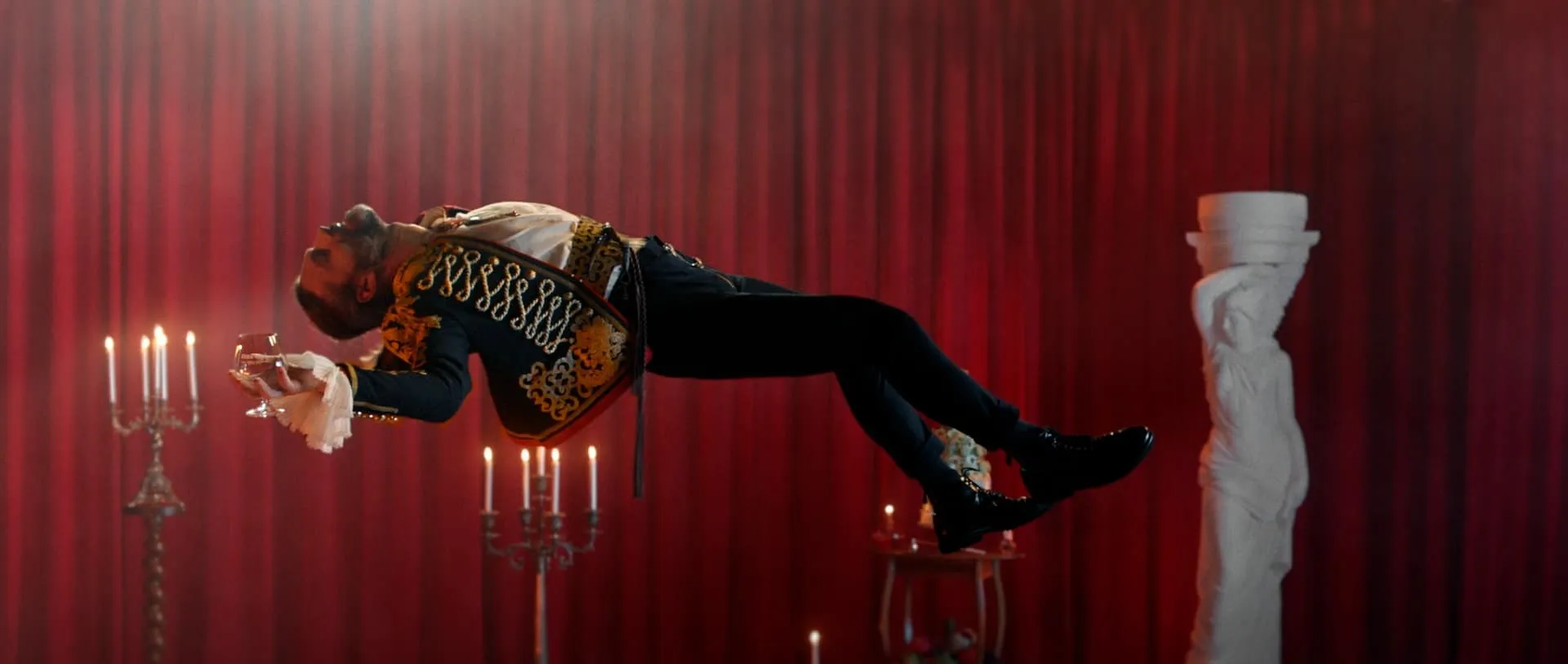 Still frame from the Cuza Vodă TV commercial "The party is not over"